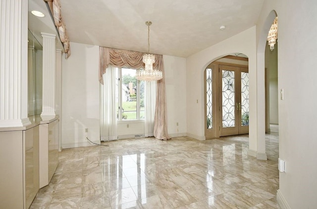 interior space with a chandelier