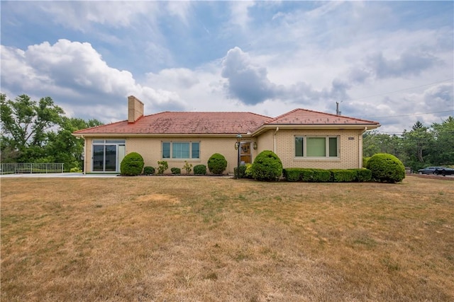 view of front of house with a front yard