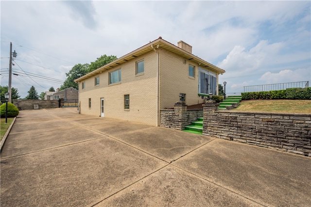 view of home's exterior featuring a patio