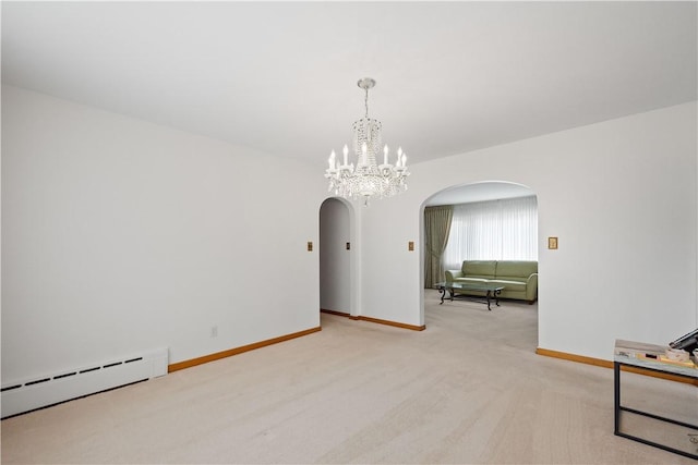 unfurnished room featuring a baseboard radiator, light colored carpet, and a notable chandelier