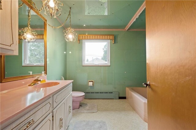 full bathroom with tile patterned flooring, toilet, vanity, tile walls, and a baseboard radiator