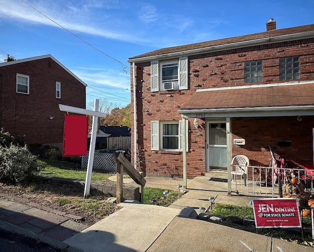 view of front of property with cooling unit