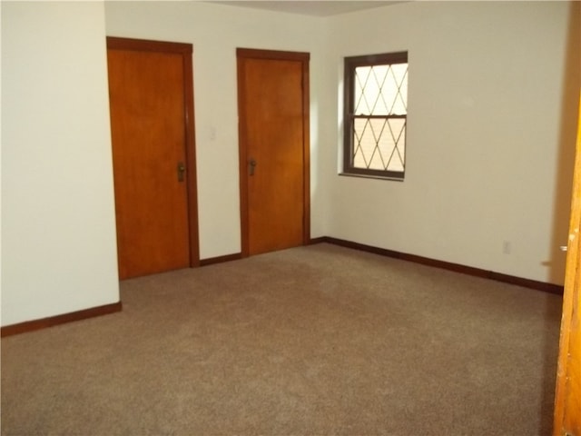 interior space with dark carpet