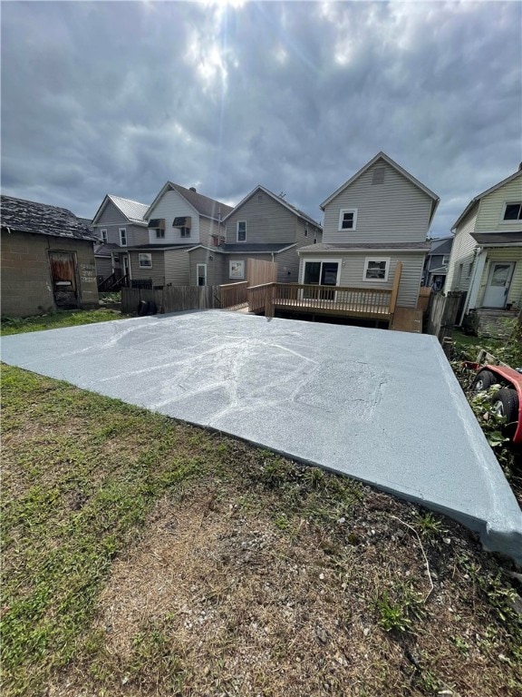 exterior space featuring a wooden deck