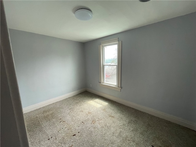 view of carpeted spare room