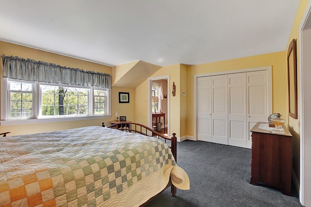 carpeted bedroom with a closet