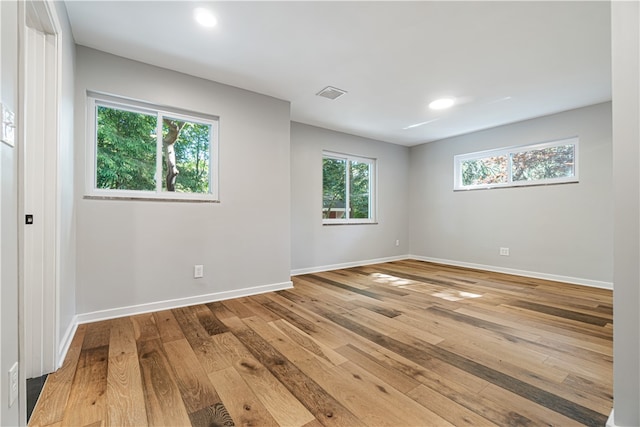 empty room featuring hardwood / wood-style flooring