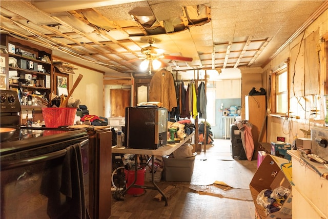 miscellaneous room featuring wood-type flooring and ceiling fan