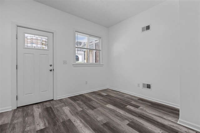 entrance foyer with dark hardwood / wood-style flooring