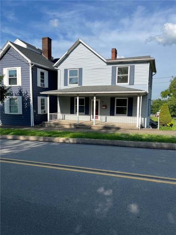 view of front of home featuring covered porch