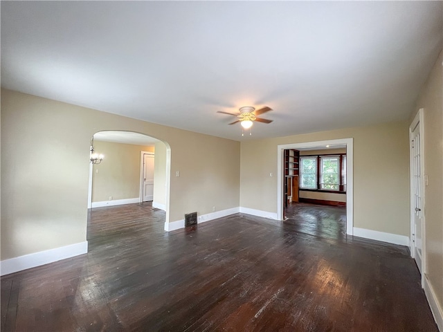 unfurnished room featuring dark hardwood / wood-style flooring and ceiling fan