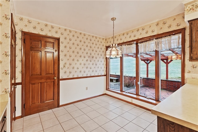 unfurnished dining area with light tile patterned floors and ornamental molding