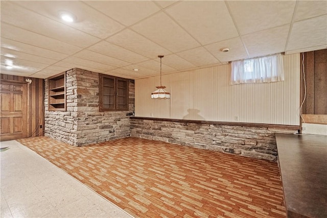 interior space featuring a paneled ceiling