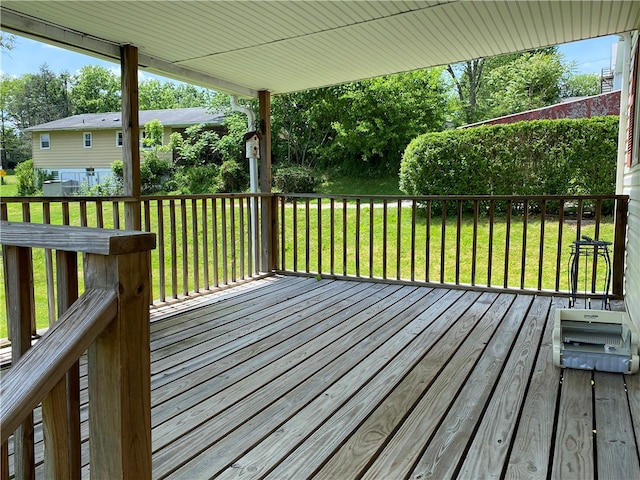 deck featuring a yard