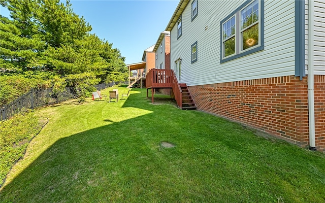 view of yard featuring a deck