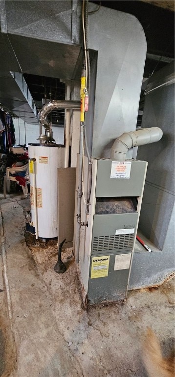 utility room with water heater