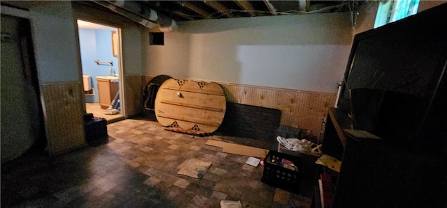 basement featuring tile flooring