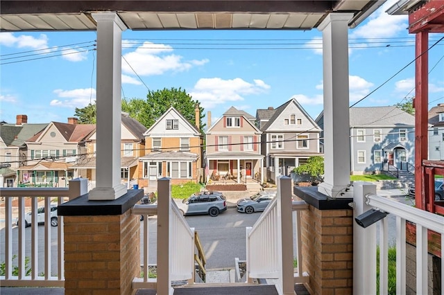 exterior space featuring ornate columns