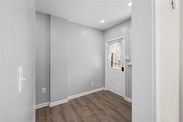 entrance foyer with dark hardwood / wood-style floors