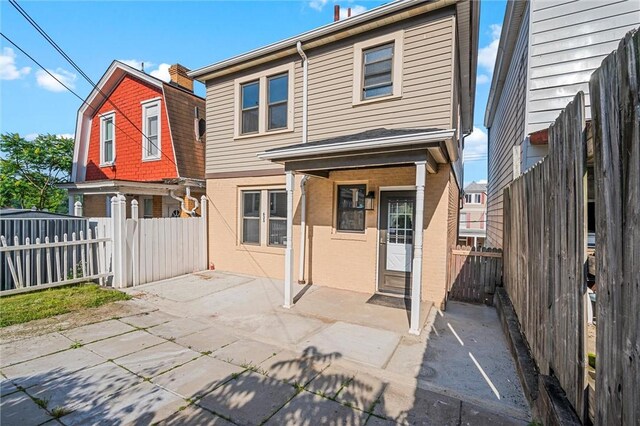 rear view of property with a patio