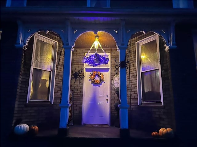 entrance to property with covered porch