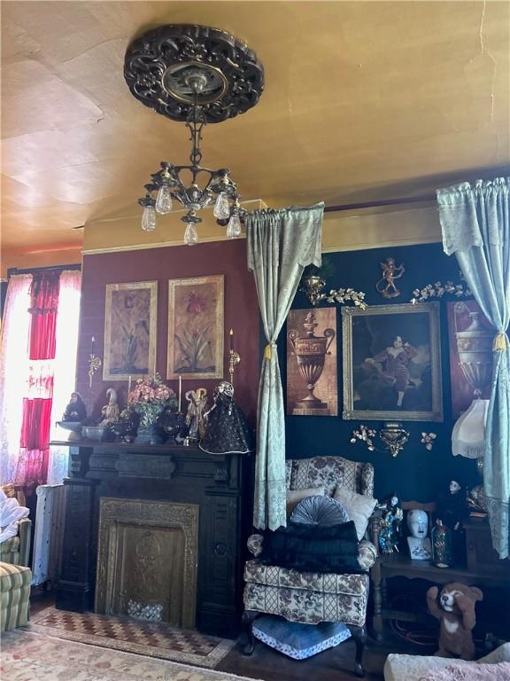 interior details featuring a notable chandelier