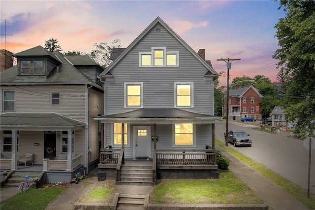 front of property featuring covered porch