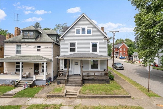 view of front property featuring a porch