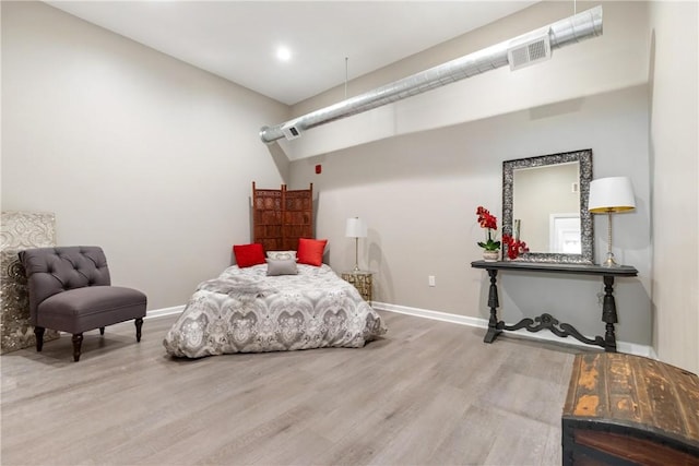 bedroom featuring wood-type flooring