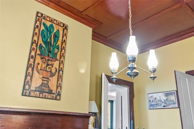 room details featuring wood ceiling, crown molding, and a chandelier