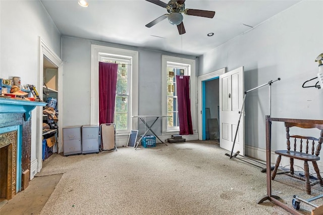 interior space featuring ceiling fan