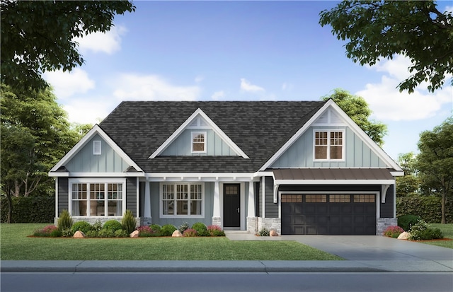 view of front of property featuring a front lawn and a garage