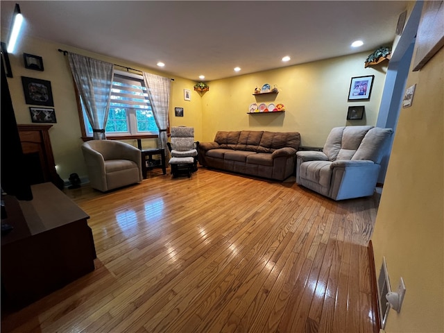 living room with hardwood / wood-style floors