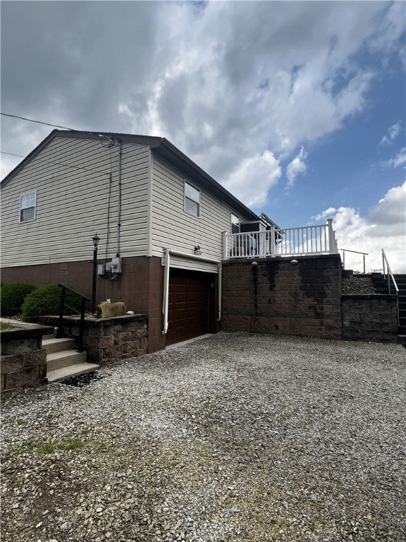 view of home's exterior featuring a garage