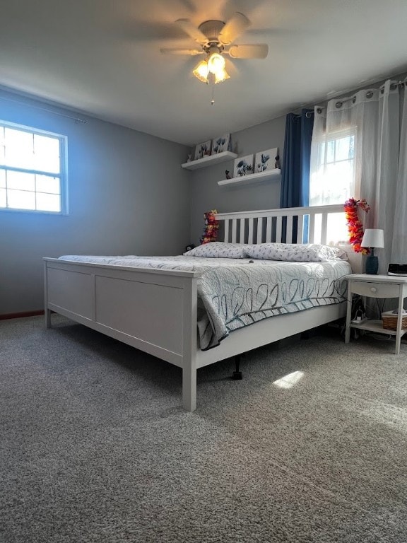 bedroom featuring carpet and ceiling fan