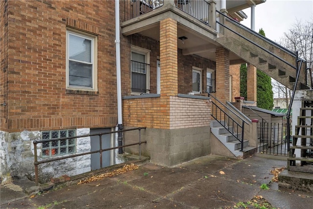 view of home's exterior featuring a balcony