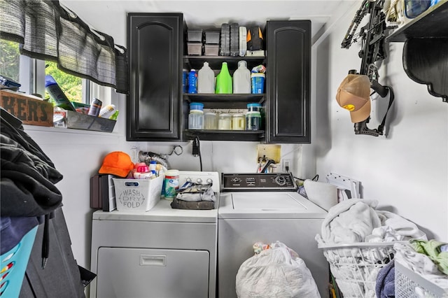 laundry area with cabinets, hookup for a washing machine, and washing machine and clothes dryer