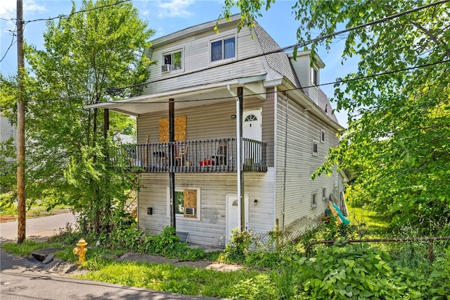 view of property with a balcony