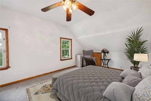 bedroom featuring ceiling fan, vaulted ceiling, and carpet floors