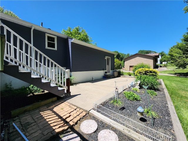 view of home's exterior featuring a patio area