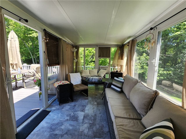 sunroom / solarium featuring plenty of natural light