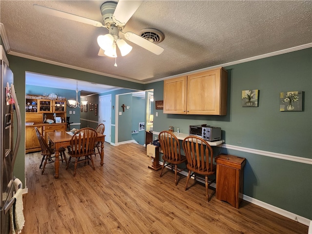 office area featuring ceiling fan, a textured ceiling, and hardwood / wood-style floors