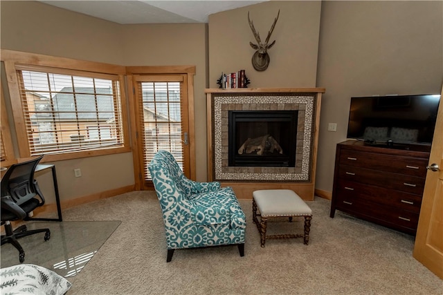 interior space with a tiled fireplace