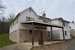 view of front of home featuring a patio area