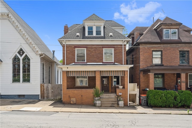 view of front of property featuring covered porch