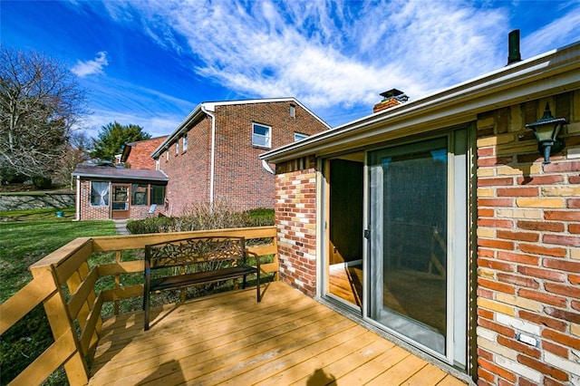 deck featuring a lawn