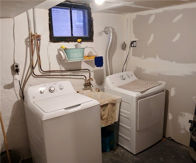 laundry room with washer and clothes dryer