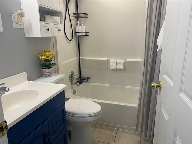 full bathroom with vanity, toilet, tile patterned floors, and shower / tub combo