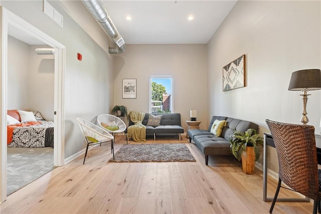 sitting room featuring light wood-type flooring