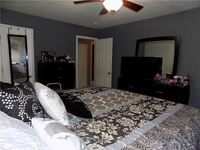 bedroom featuring ceiling fan